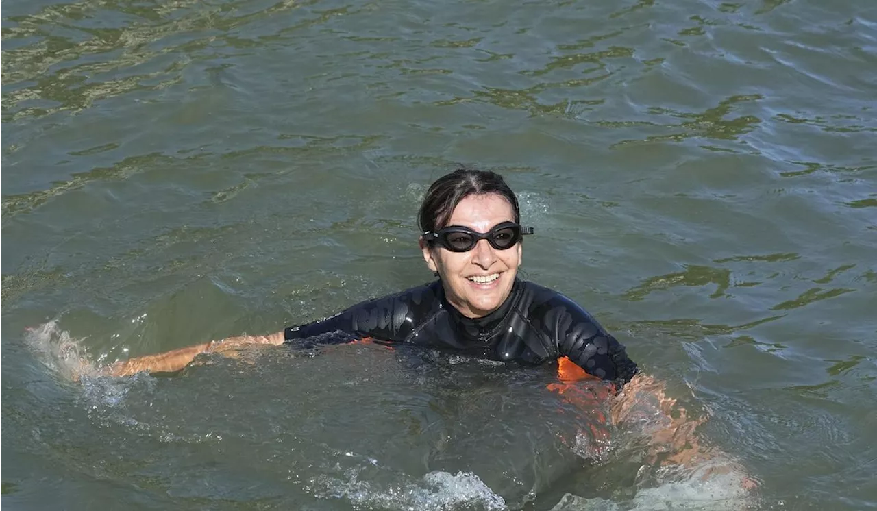 Paris Mayor Hidalgo swims in Seine River to showcase its improved cleanliness before Olympic events