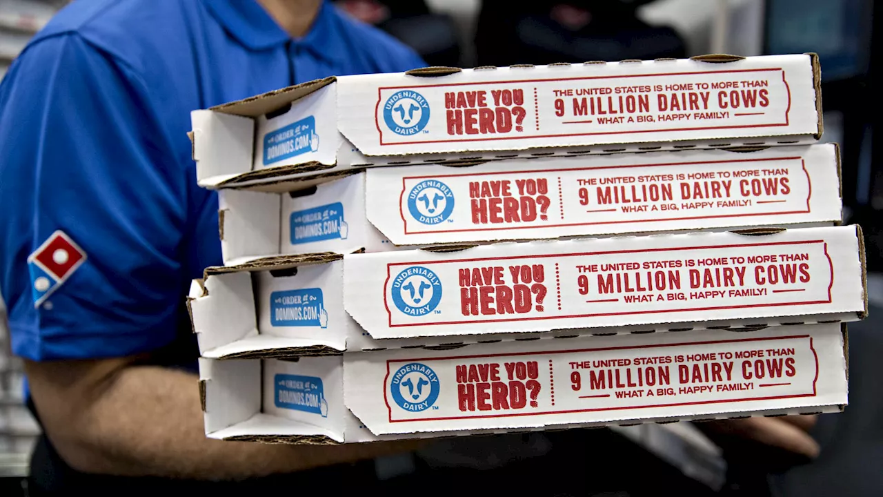 Stocks making the biggest moves premarket: Domino's, Warner Bros. Discovery, United Airlines and more