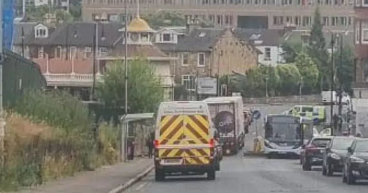 Man rushed to hospital after being hit by bus on Scots street