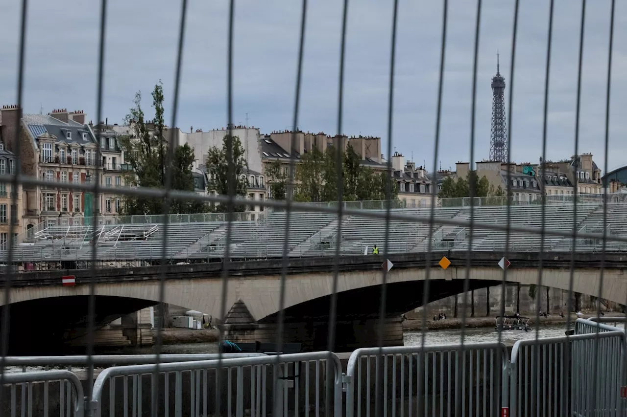 Paris police sealing off Seine River ahead of Olympics opening ceremony