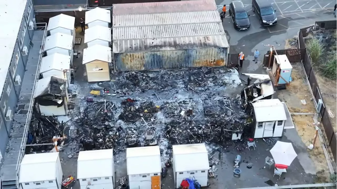 Man arrested after fire damages 25 tiny homes near Seattle waterfront