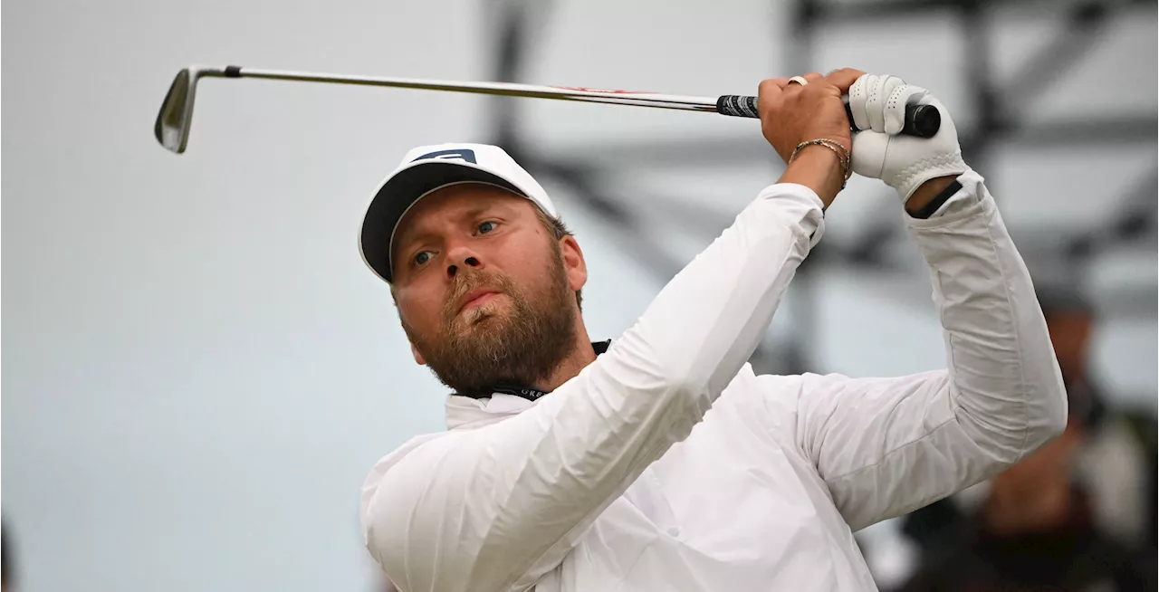 Daniel Brown leads over Shane Lowry in wind-challenged 2024 Open Championship