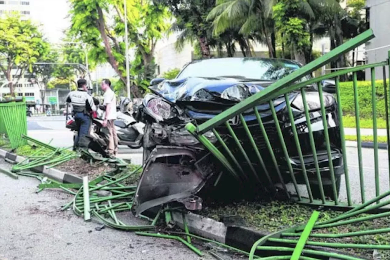 Private-hire car crashes into median railing in Toa Payoh