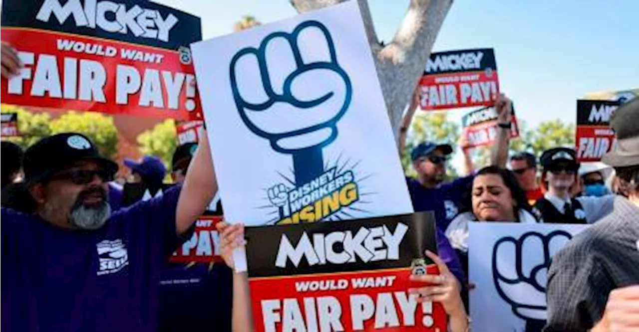 Disneyland workers threaten strike over wages, treatment