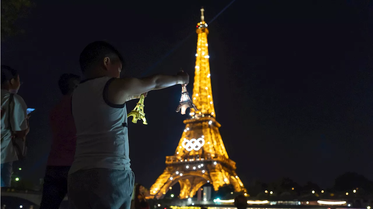 Paris police are sealing off the Seine River ahead of the Olympics opening ceremony