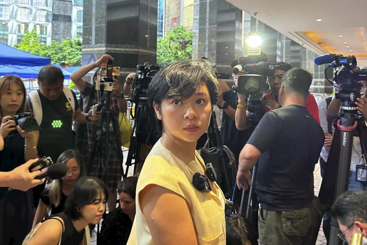 The head of Hong Kong's leading journalist group says she lost WSJ job after refusing to drop role