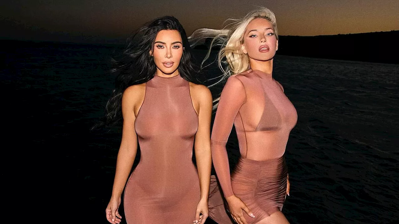 Kim Kardashian slips her famous curves into sheer bodycon dress alongside new busty BFF Olivia...