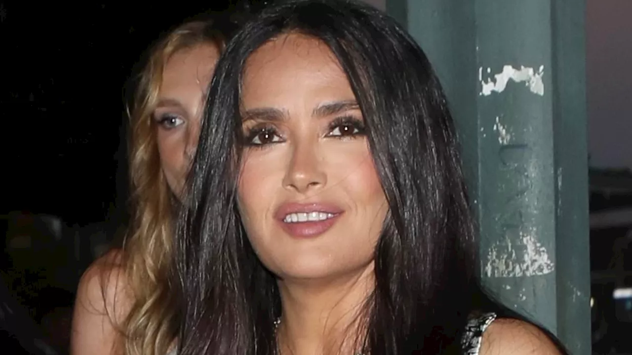 Salma Hayek, 57, is ever the brunette bombshell in busty optical illusion dress as she arrives at...