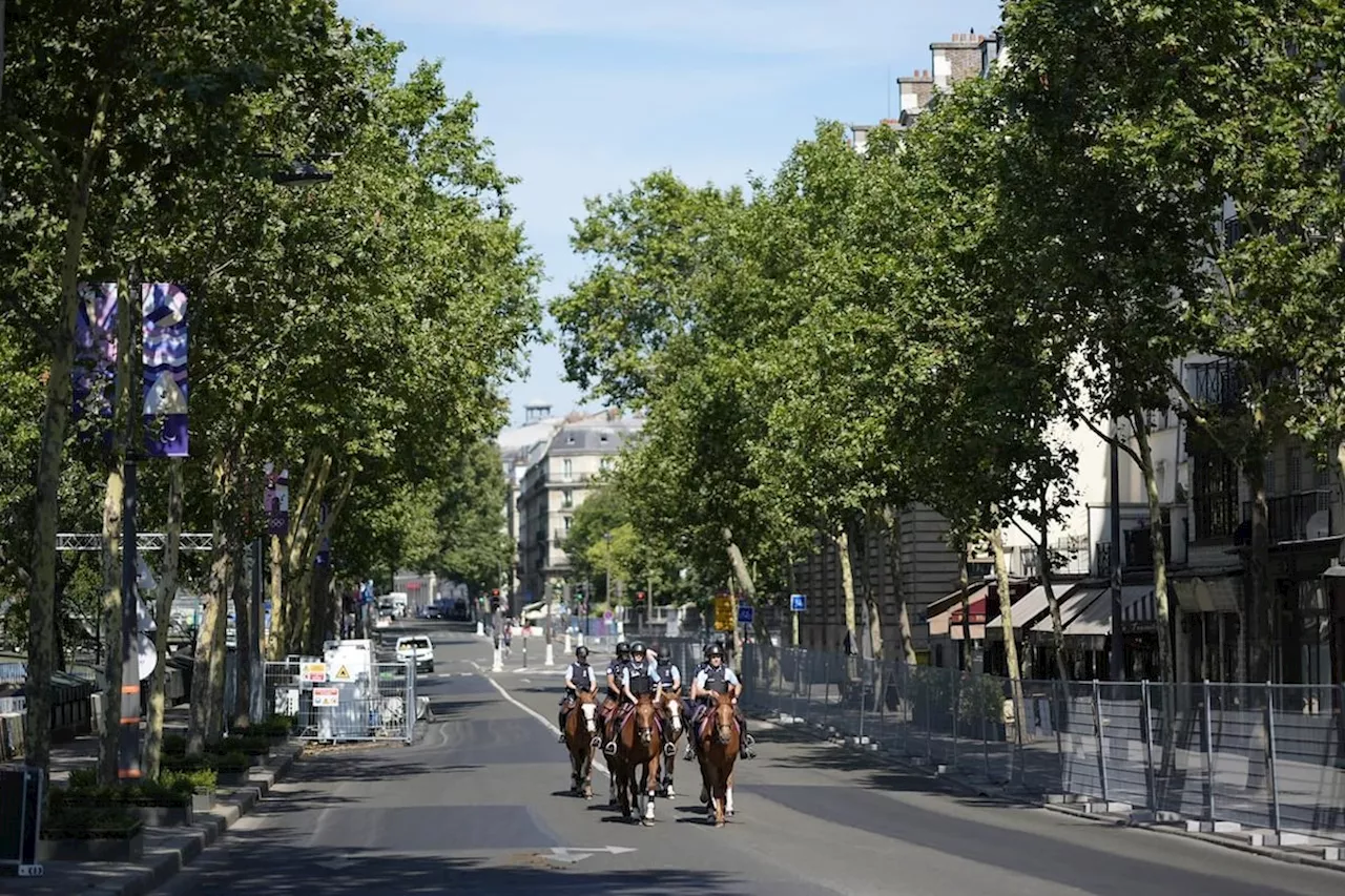 Paris police are sealing off the Seine River ahead of the Olympics opening ceremony