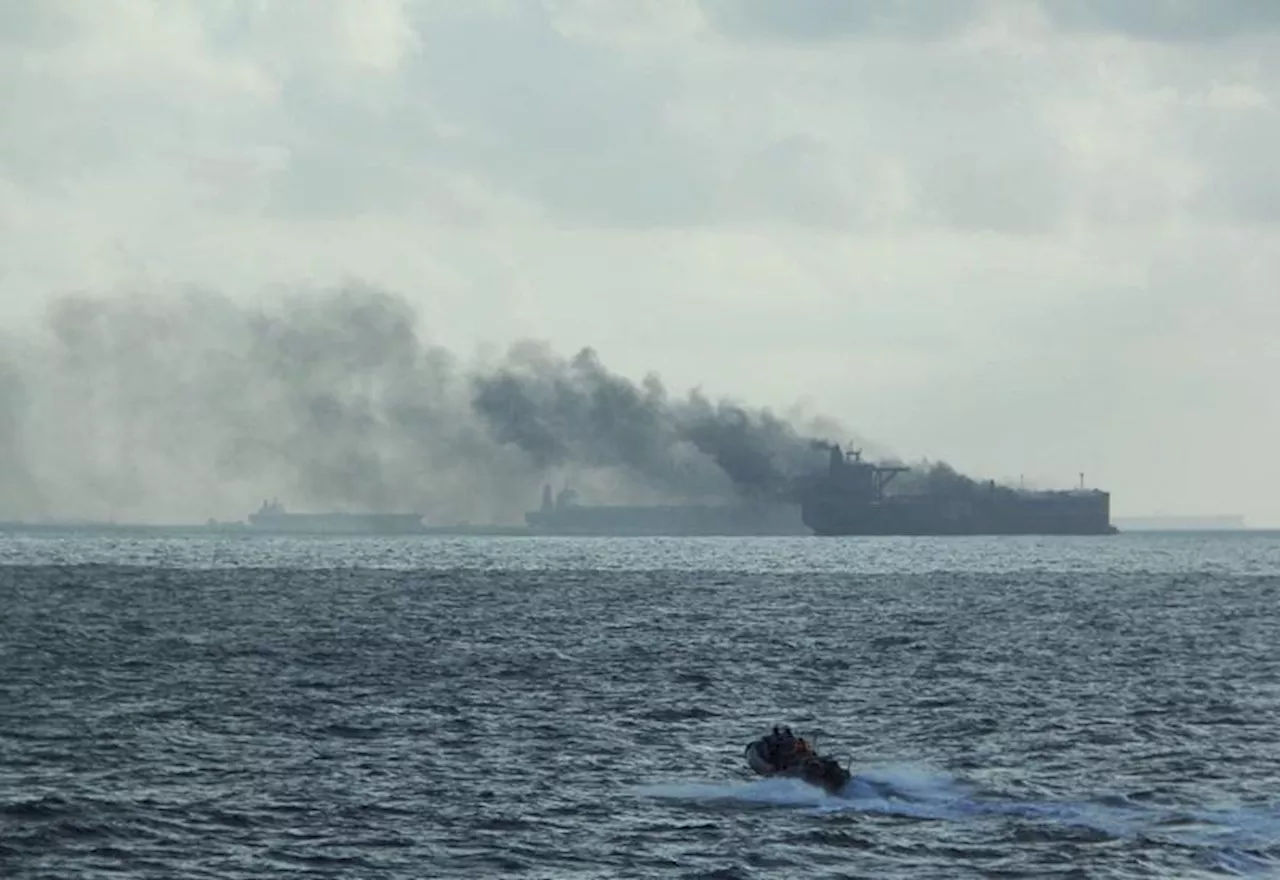 Oil tankers on fire after colliding close to Singapore, crew rescued