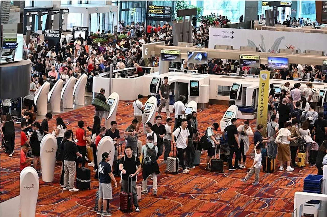 Manual check-ins for over 10 airlines at Changi Airport after IT disruption