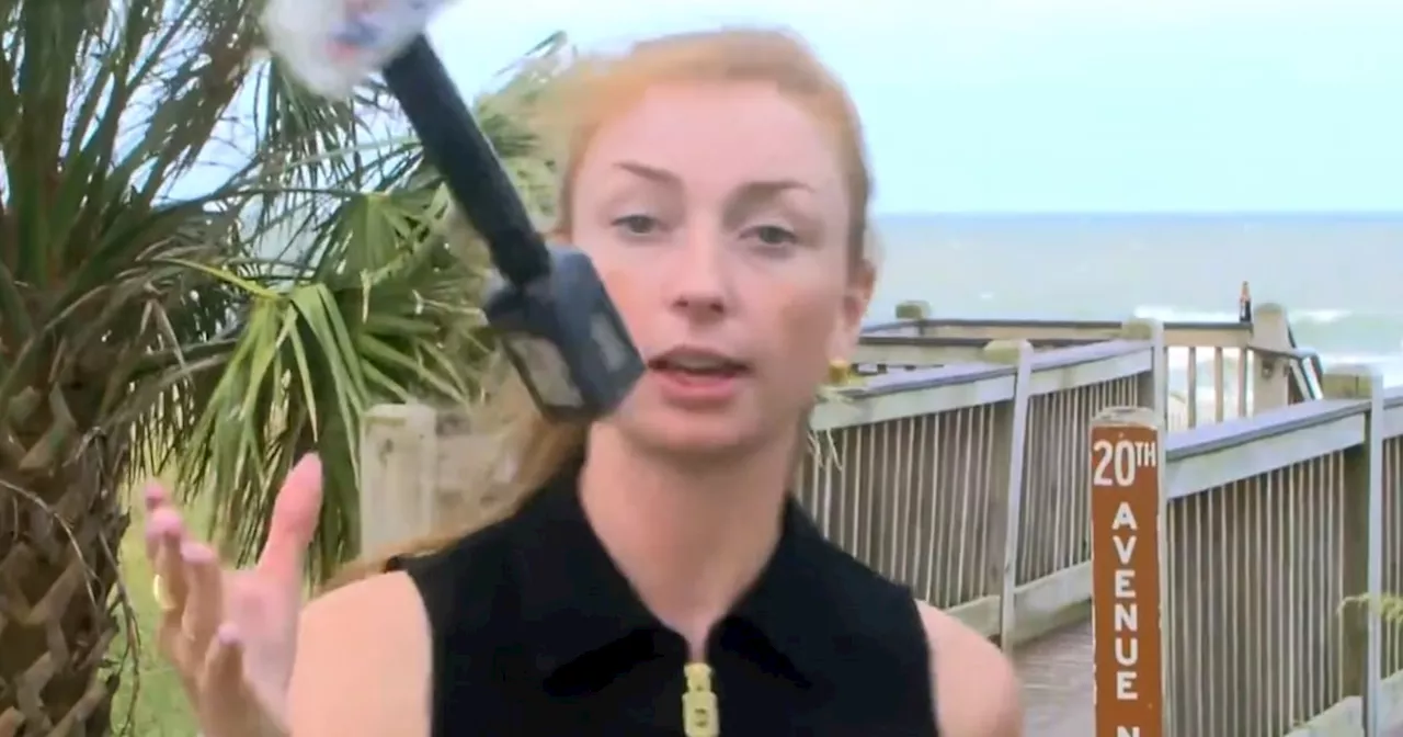 Reporter Goes Viral For Smooth Mic Toss While Unknowingly On TV