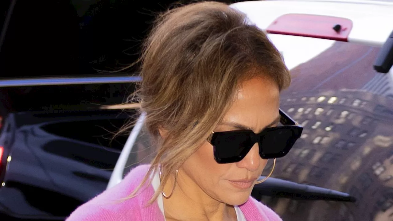 Jennifer Lopez flashes washboard abs as she channels her Jenny from the Block era