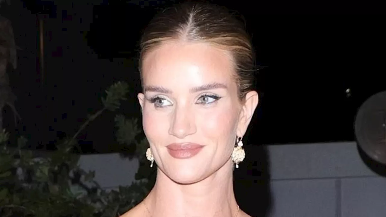 Rosie Huntington-Whiteley stuns in a sequin black gown as she joins risqué Alessandra Ambrosio and...