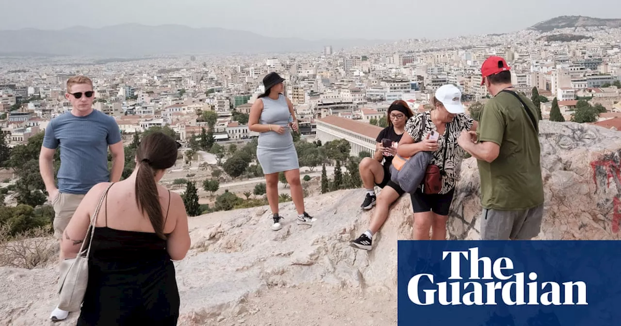 ‘My escape is going north’: heatwaves begin to drive tourists in Europe to cool climes