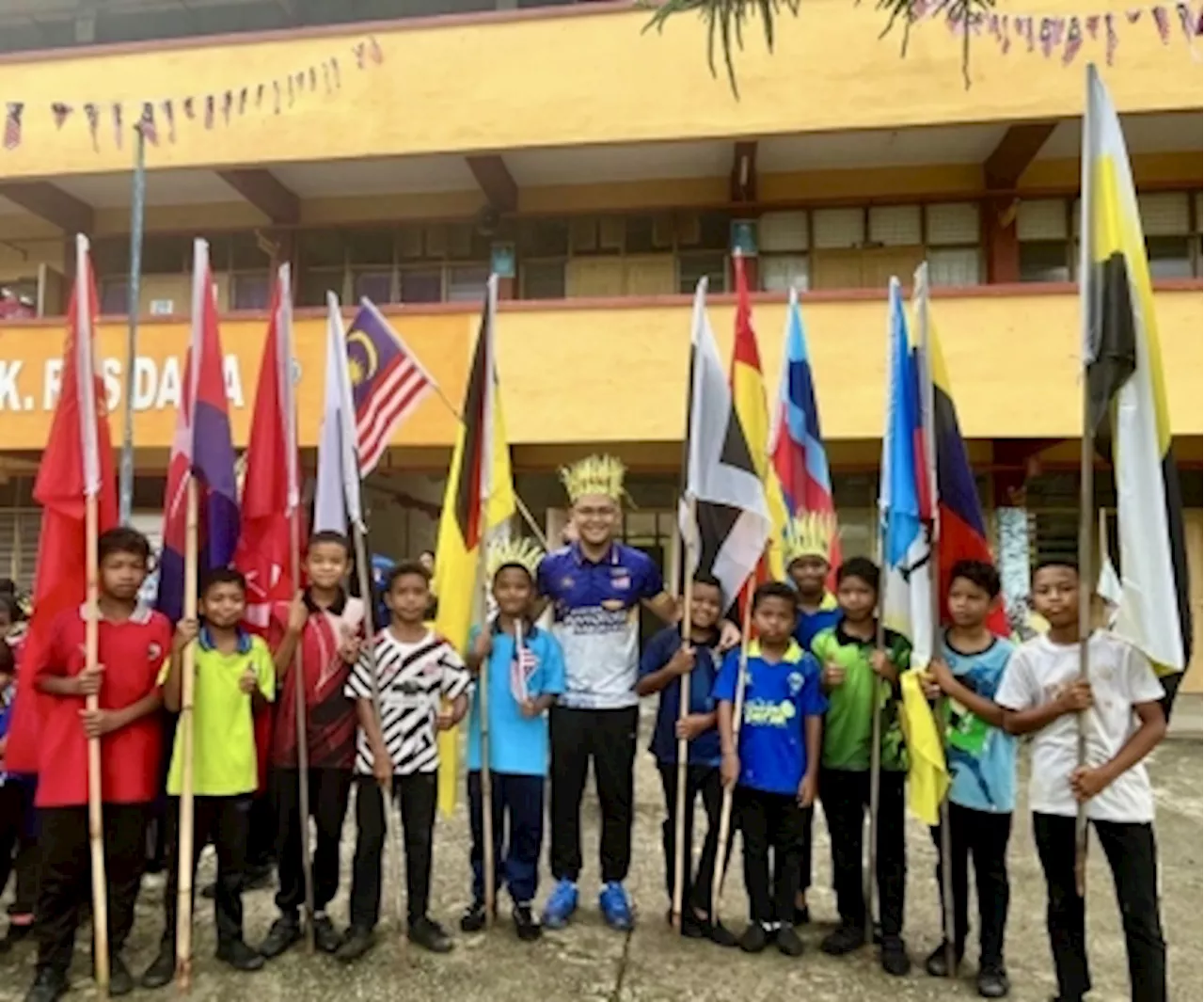 Teacher's 'cooking show' and coconut processing lessons entices Orang Asli children to learn English