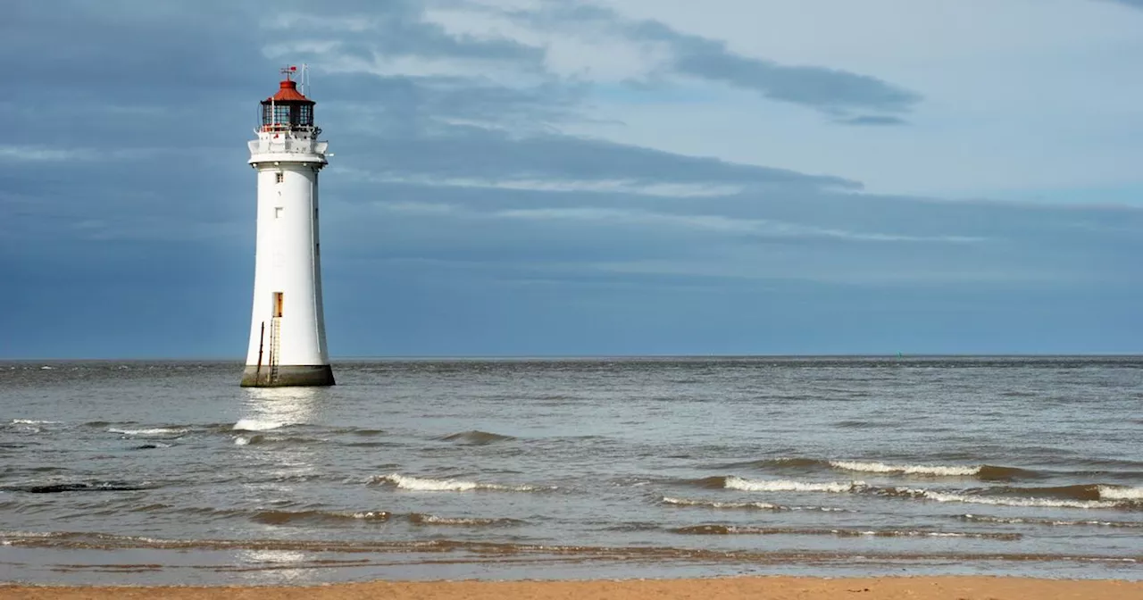 'Stunning sunset beach' with lighthouse just an hour from Manchester