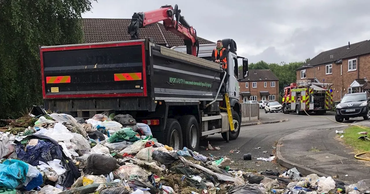 The scale of rubbish dumped onto road as vape causes bin lorry fire