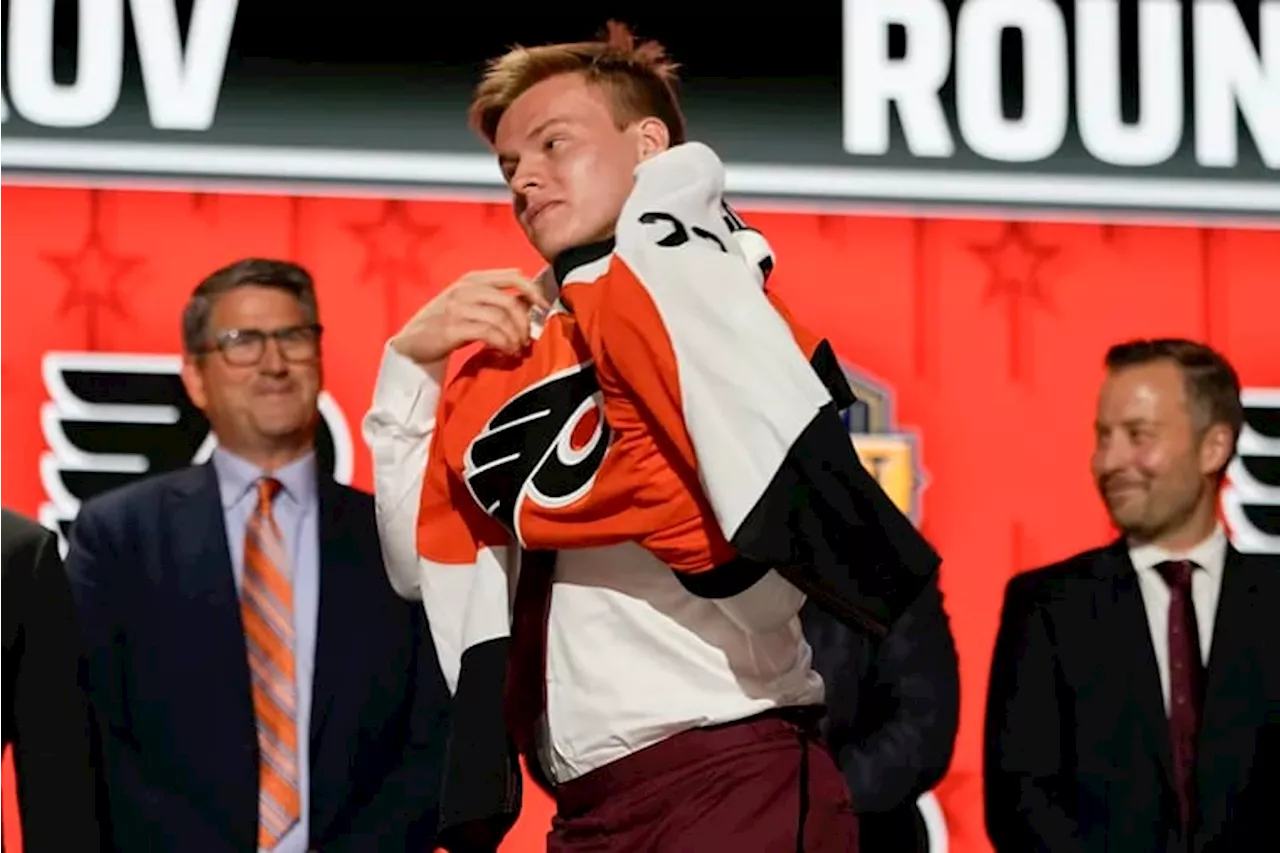 Matvei Michkov signs his entry-level contract with the Flyers