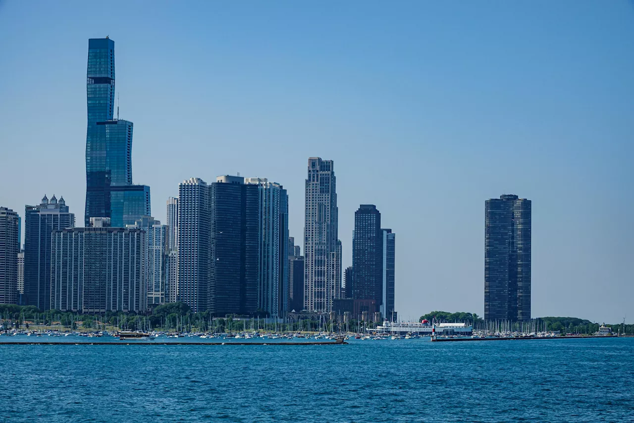 Gov. Pritzker signs federal and state agreement to protect Lake Michigan from invasive carp