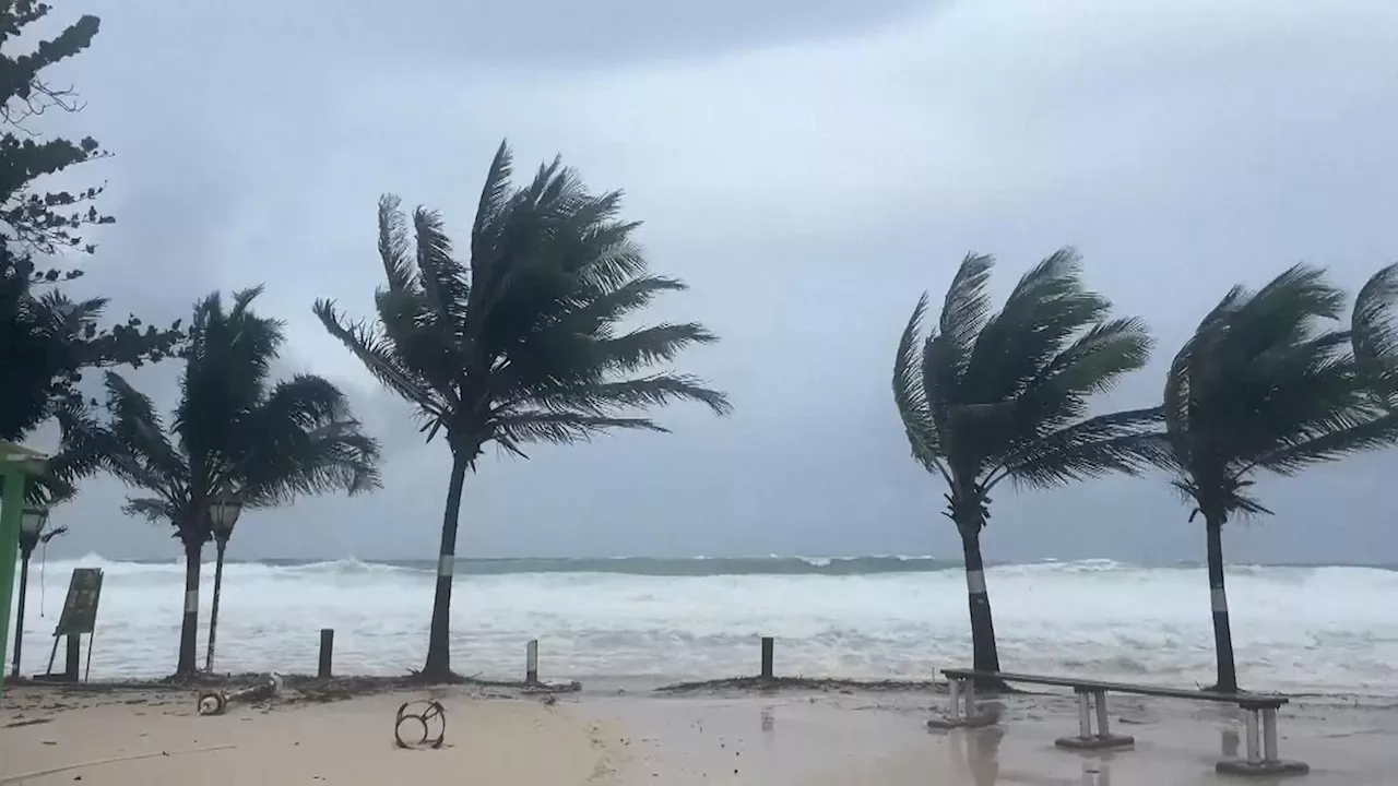 'Monster' Hurricane Beryl upgraded to category five as it slams into Caribbean