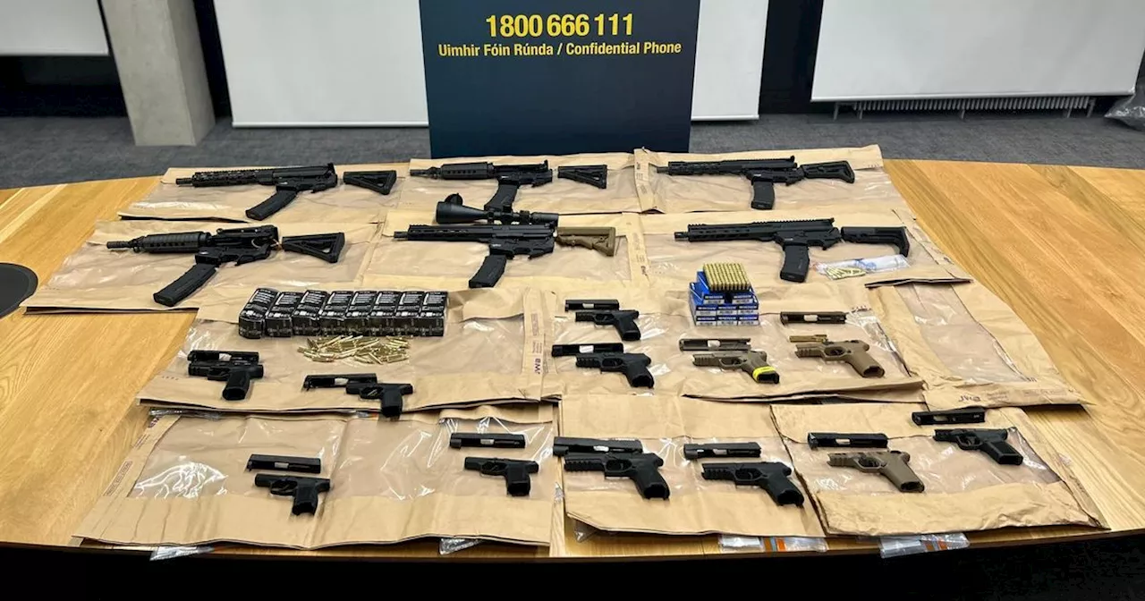 PIC: 6 assault rifles, 12 semi-automatic handguns and 900 rounds of ammo seized