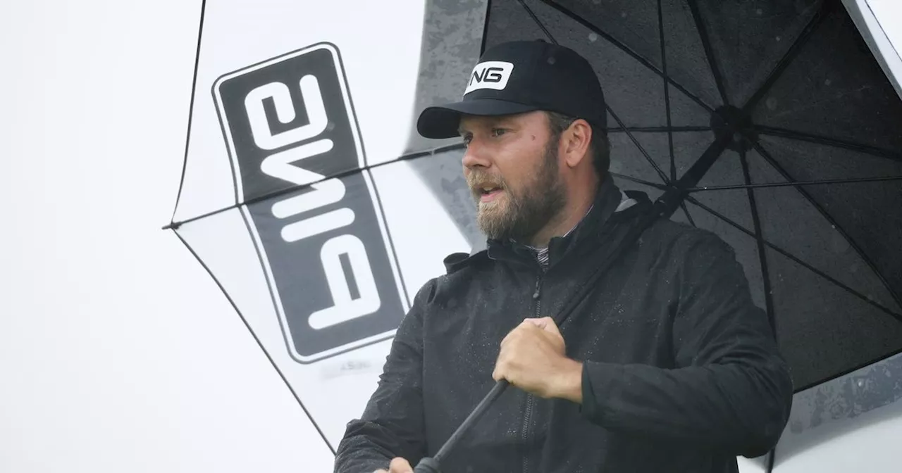 Shane Lowry's playing partner seen smoking cigarette during Open third round