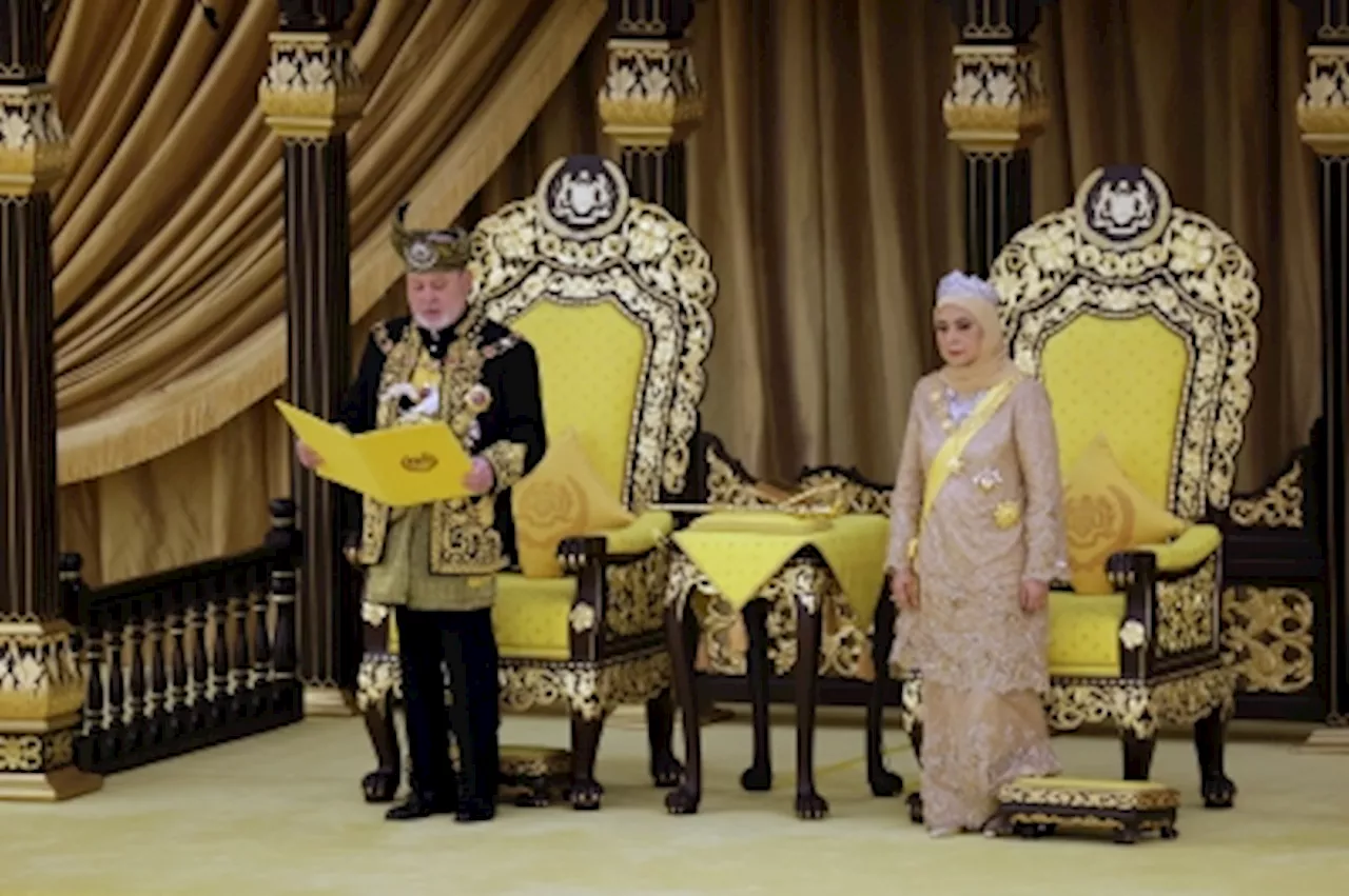 17th King’s installation: Queen dazzles in golden hibiscus-embroidered Kurung Johor by Radzuan Radziwill