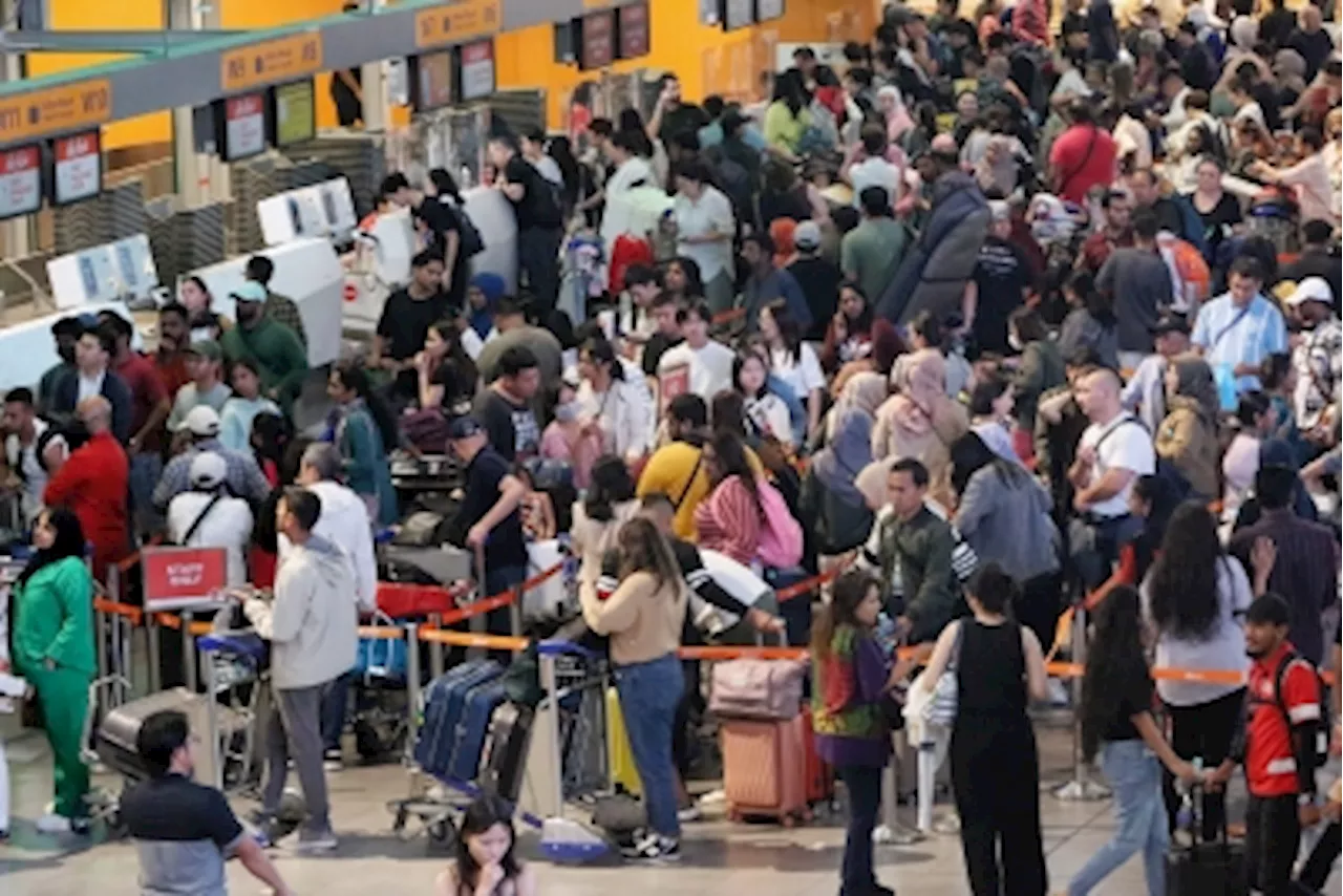 ‘Waiting for the unknown’: Travellers at KLIA’s Terminal 2 recount chaos as CrowdStrike outage brings travel to standstill