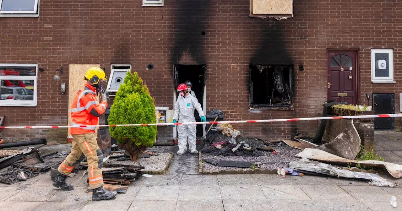 Forensic officers comb flat as man arrested after suspected arson attack