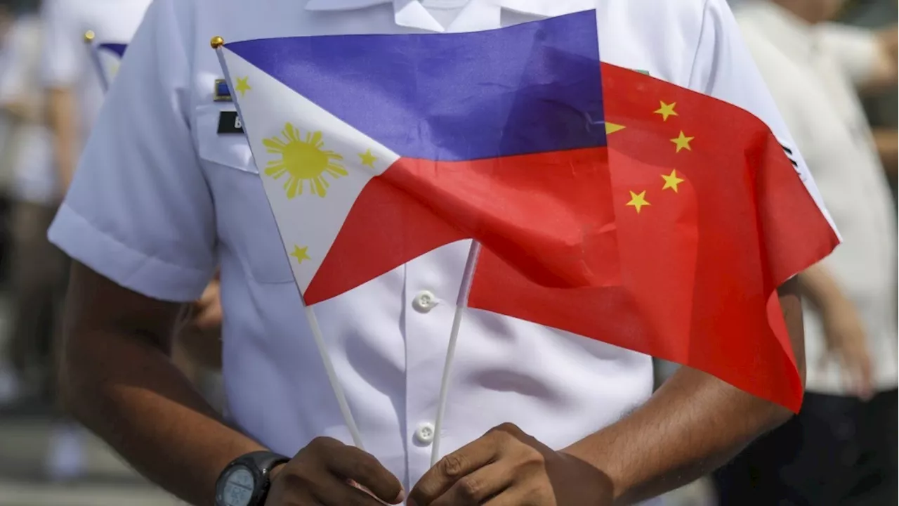 China and the Philippines reach deal in effort to stop clashes at fiercely disputed shoal