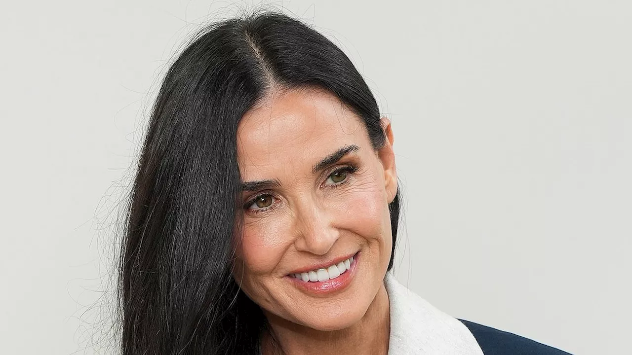 Demi Moore, 61, stuns in tiny white bikini while on grandma duty with little Louetta on family...