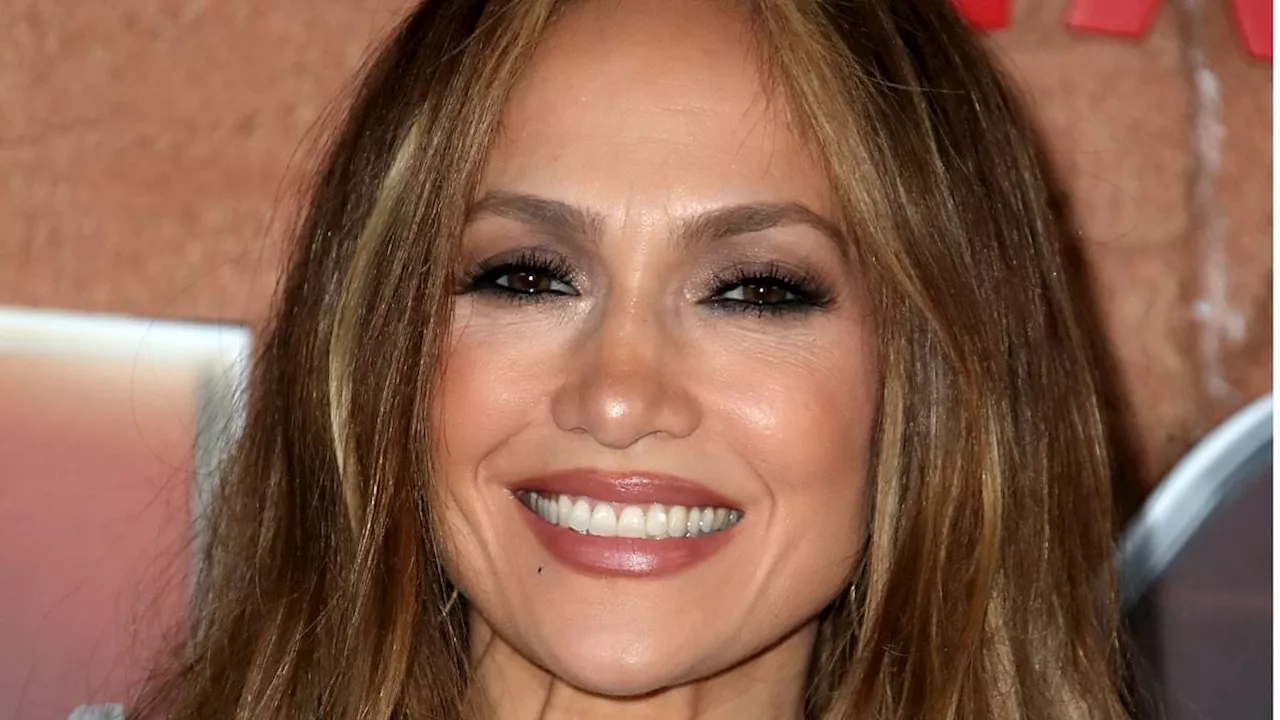 Frozen in time: How Jennifer Lopez, 54, hasn't aged a day despite swearing she has never touched...