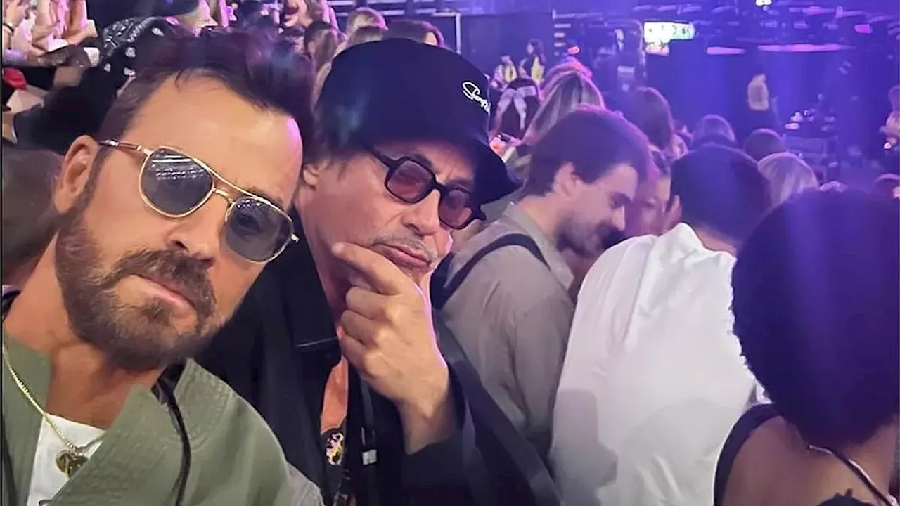 Justin Theroux takes a silly selfie with pal Robert Downey Jr. as they attend Olivia Rodrigo concert...