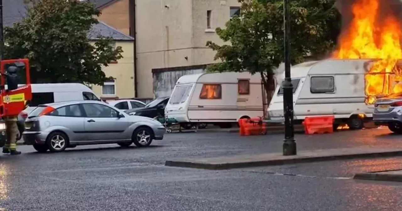 Flames engulf caravan in Johnstone car park as firefighters tackle blaze