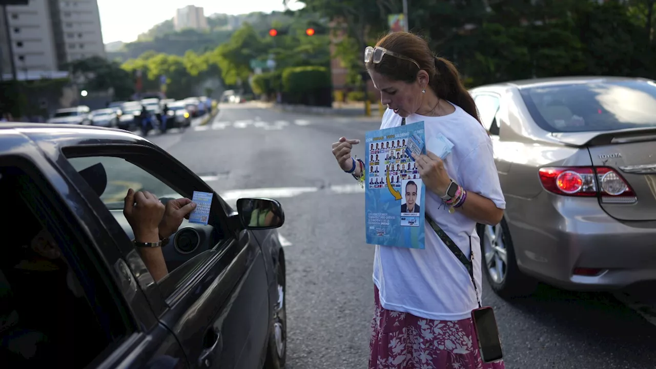 Venezuelan opposition voters band to safeguard election, warning of the ruling party's tricks