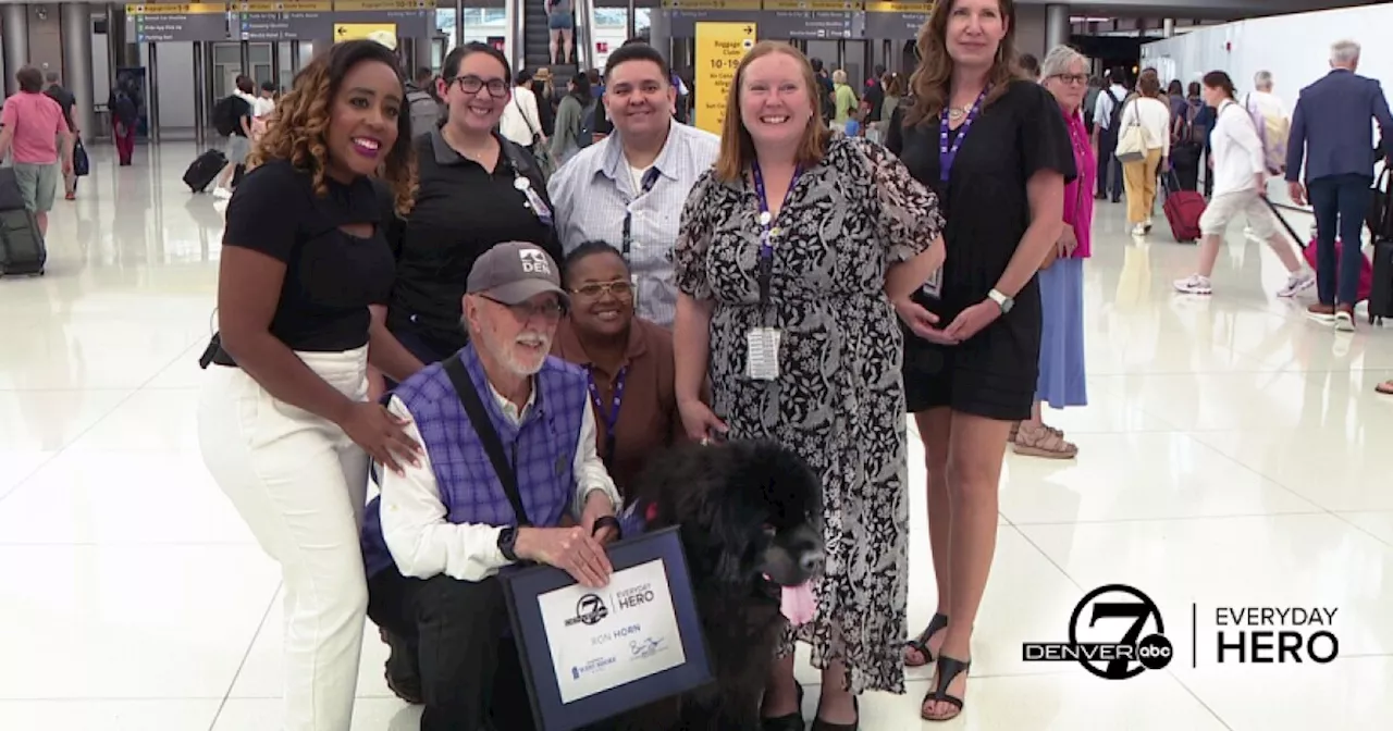 Volunteer and his 10-year-old Newfoundland keep travelers at ease at Denver airport