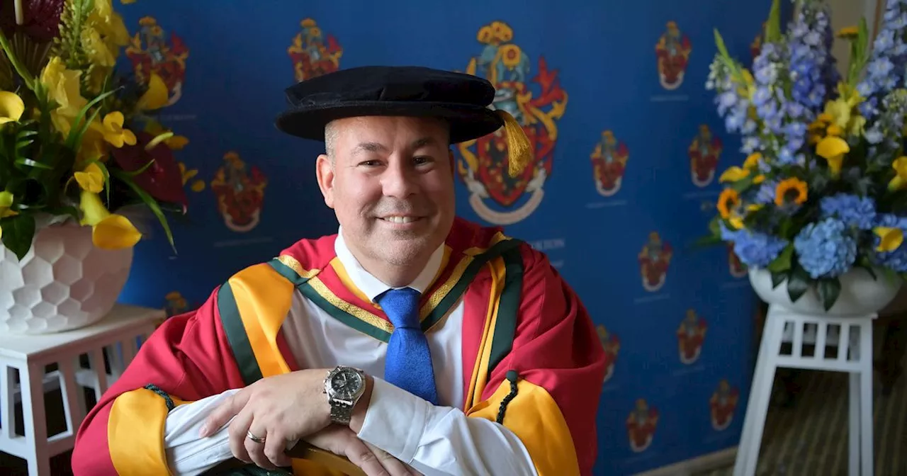 Fundraiser who 'could only dream' of higher education gets Honorary Doctorate