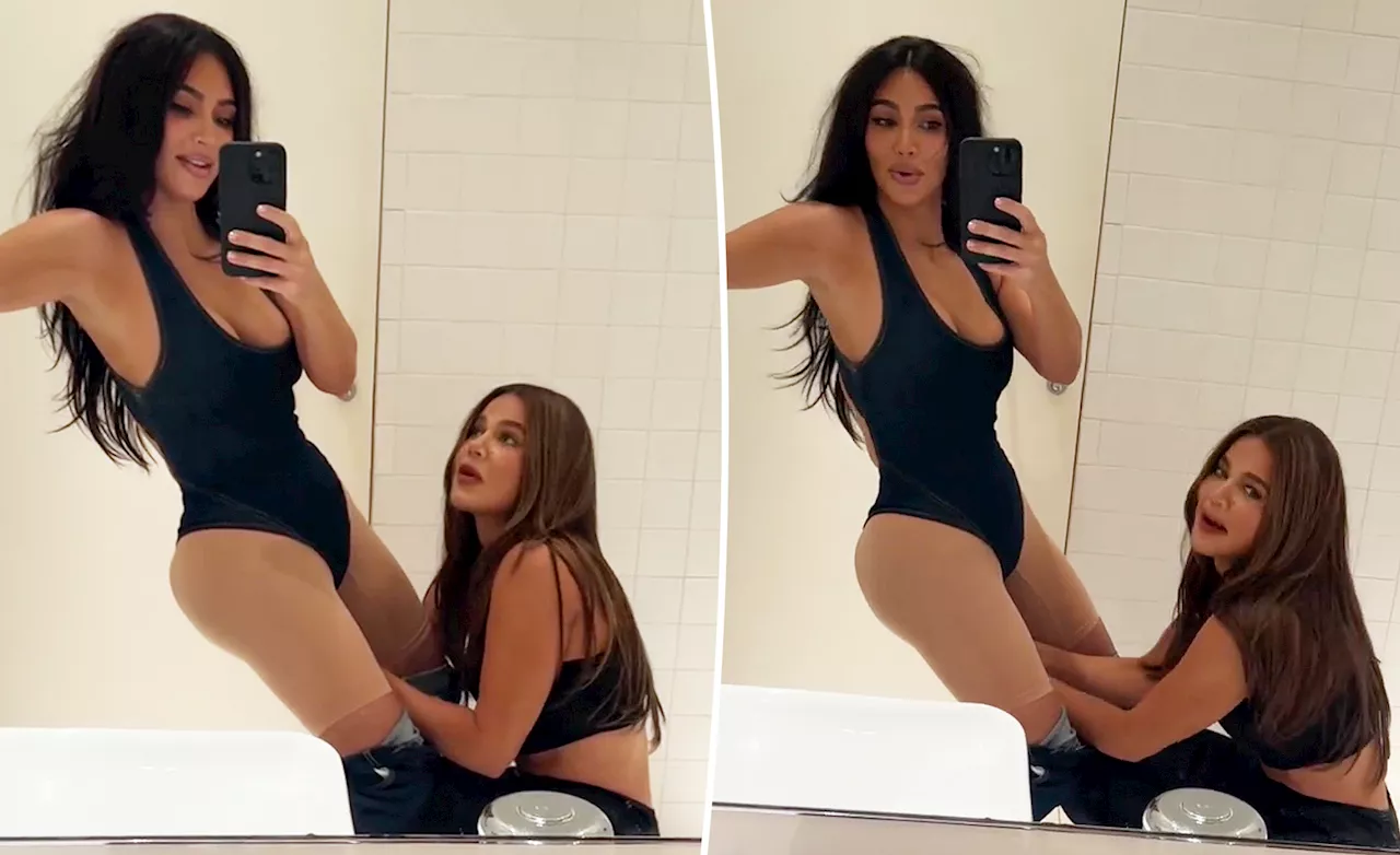 Khloé Kardashian hilariously helps Kim snap her bodysuit shut: 'This is what sisters do'