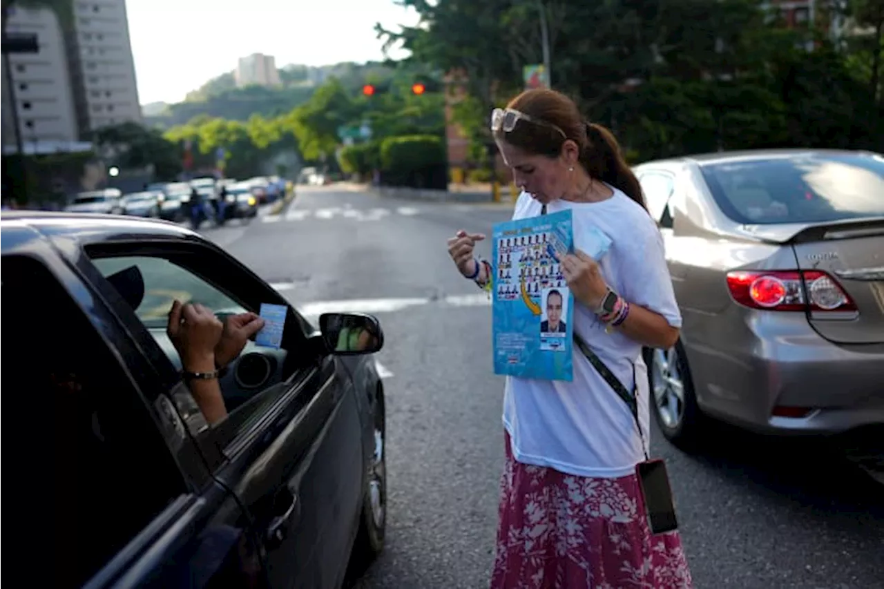 Venezuelan opposition voters band to safeguard election, warning of the ruling party's tricks