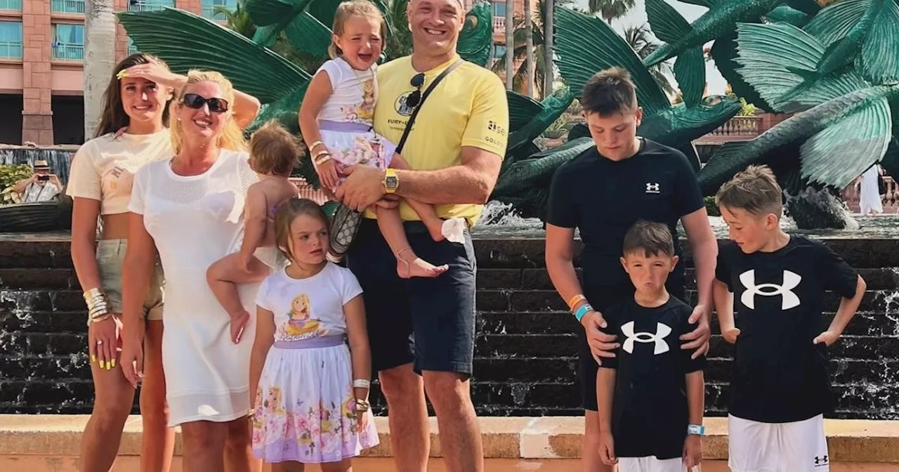 Paris Fury shows off her 'tan lines' on holiday with Tyson and their seven kids