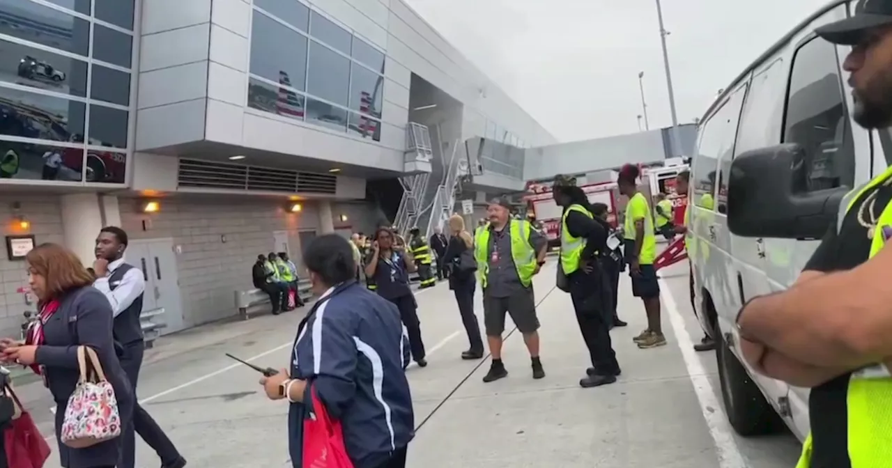 JFK Airport fire causes Terminal 8 to be evacuated, as international travelers scramble to catch flights