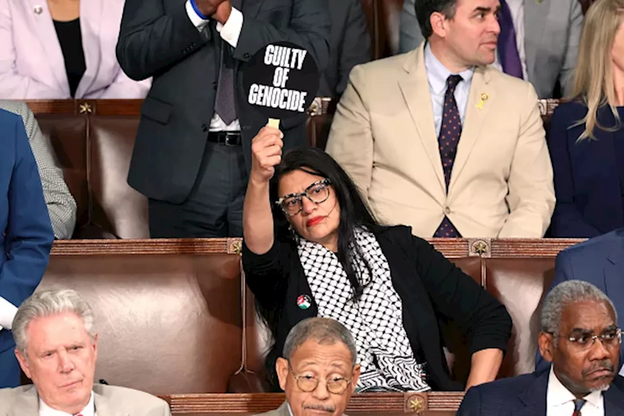 Tlaib silently protests Netanyahu speech with ‘War Criminal’ sign