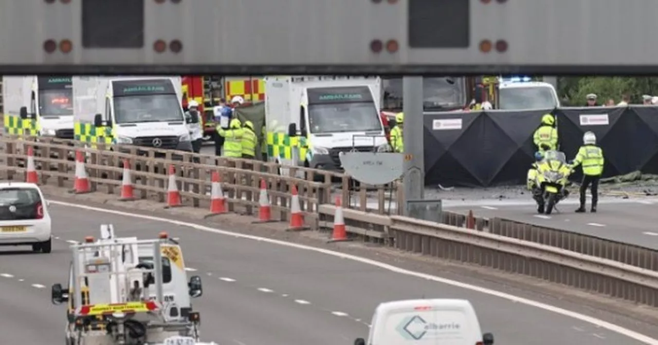 Police car involved in horror Glasgow M8 crash as four rushed to hospital