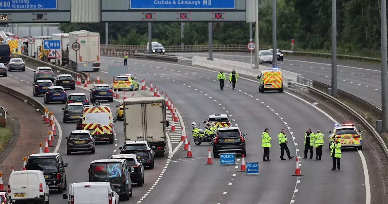 Three men 'fighting for life' after Glasgow M8 crash including police officer