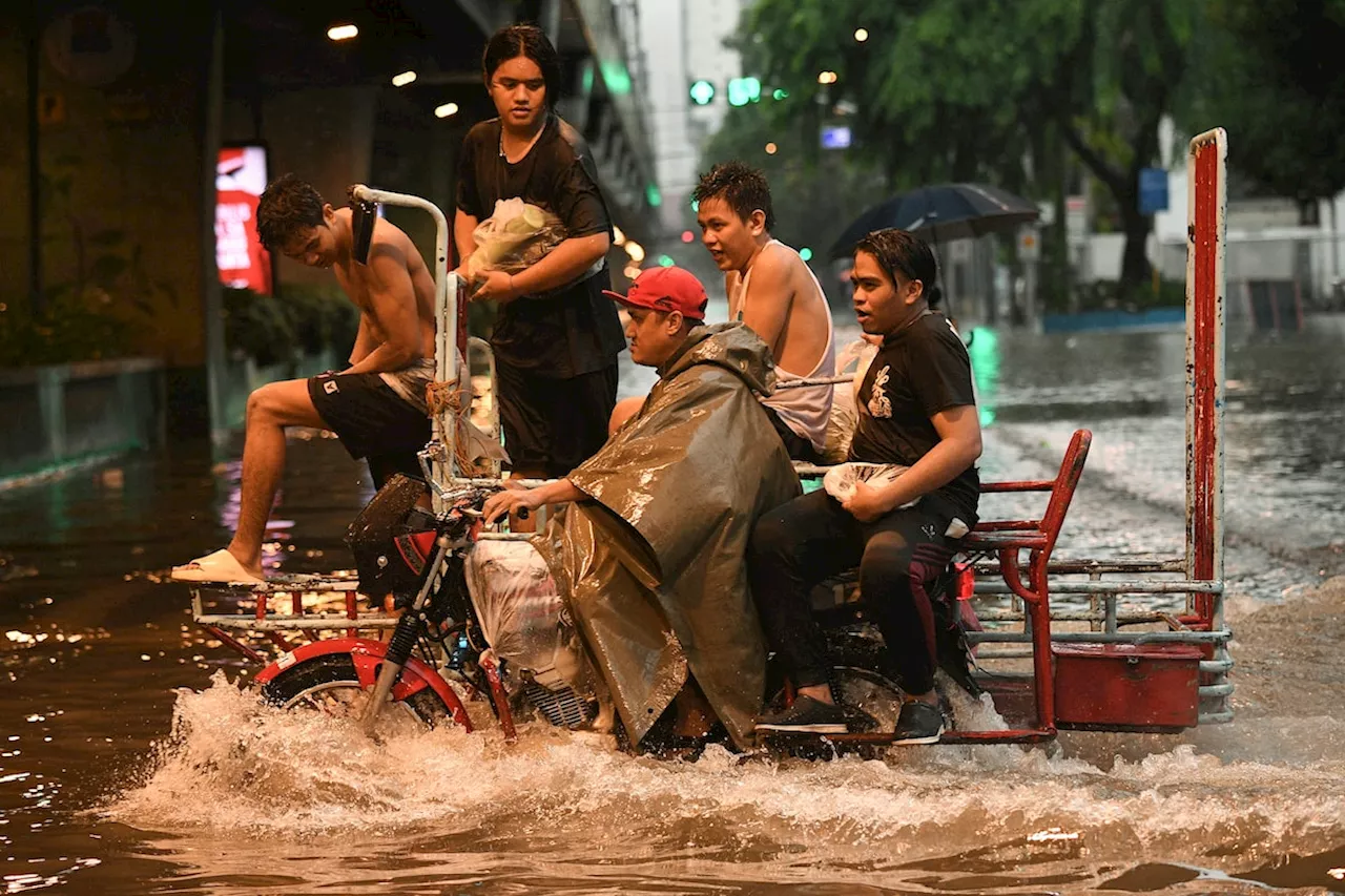 Monsoon rains worsened by Typhoon Gaemi leave eight dead and displace 600,000 in Philippines