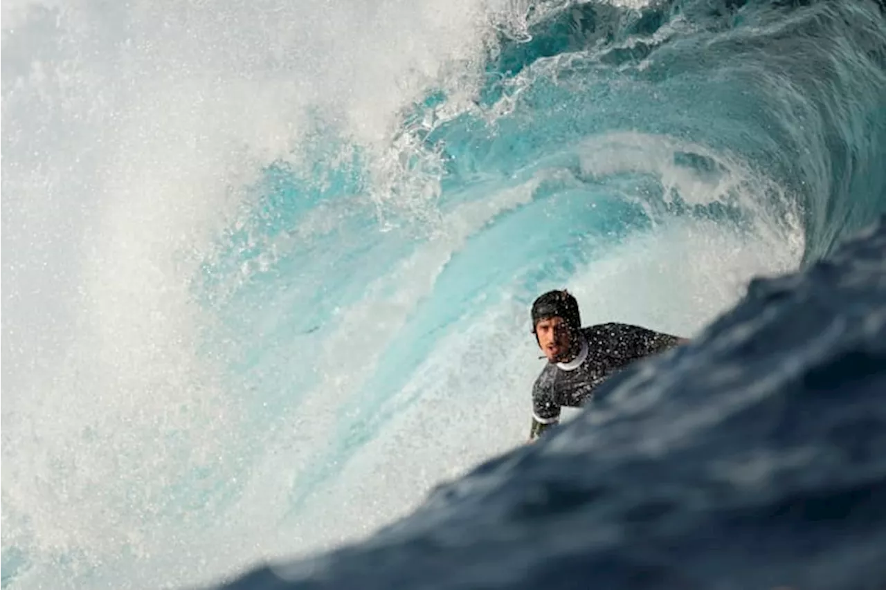 Surfers, staff and locals make final preparations in Tahiti before the Paris Olympics begin