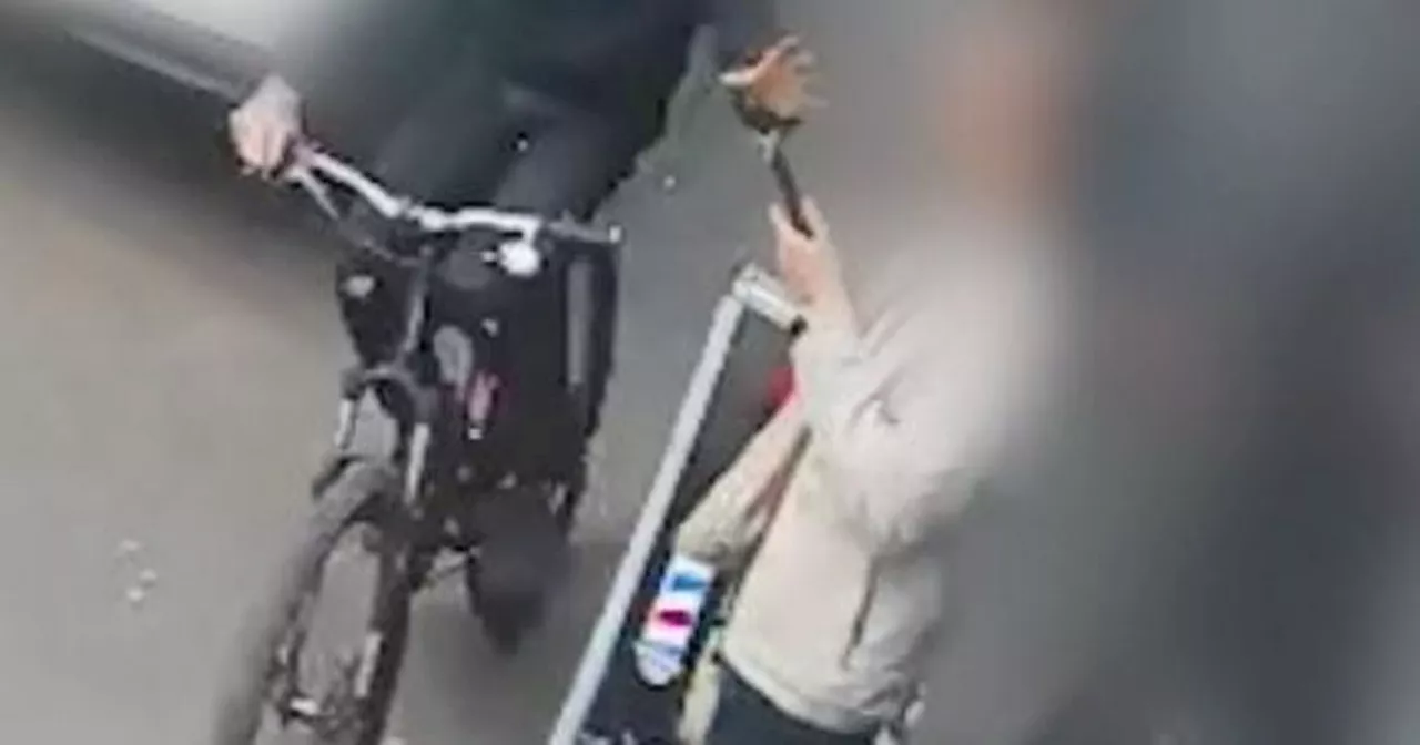 WATCH: CCTV of callous biker swiping phones out of hands across Manchester