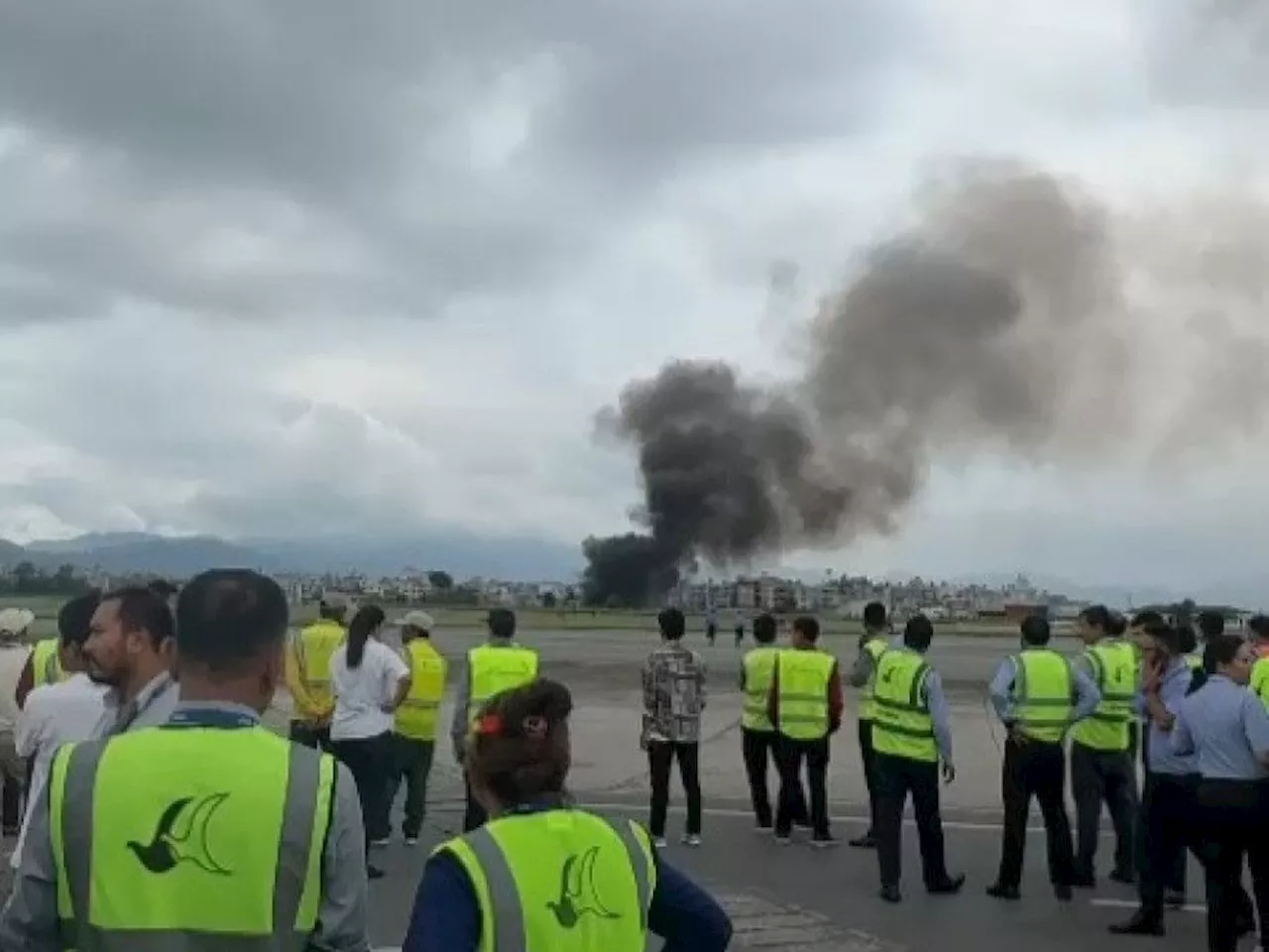 Five dead as Nepal plane skids off runway and catches fire, media and officials say