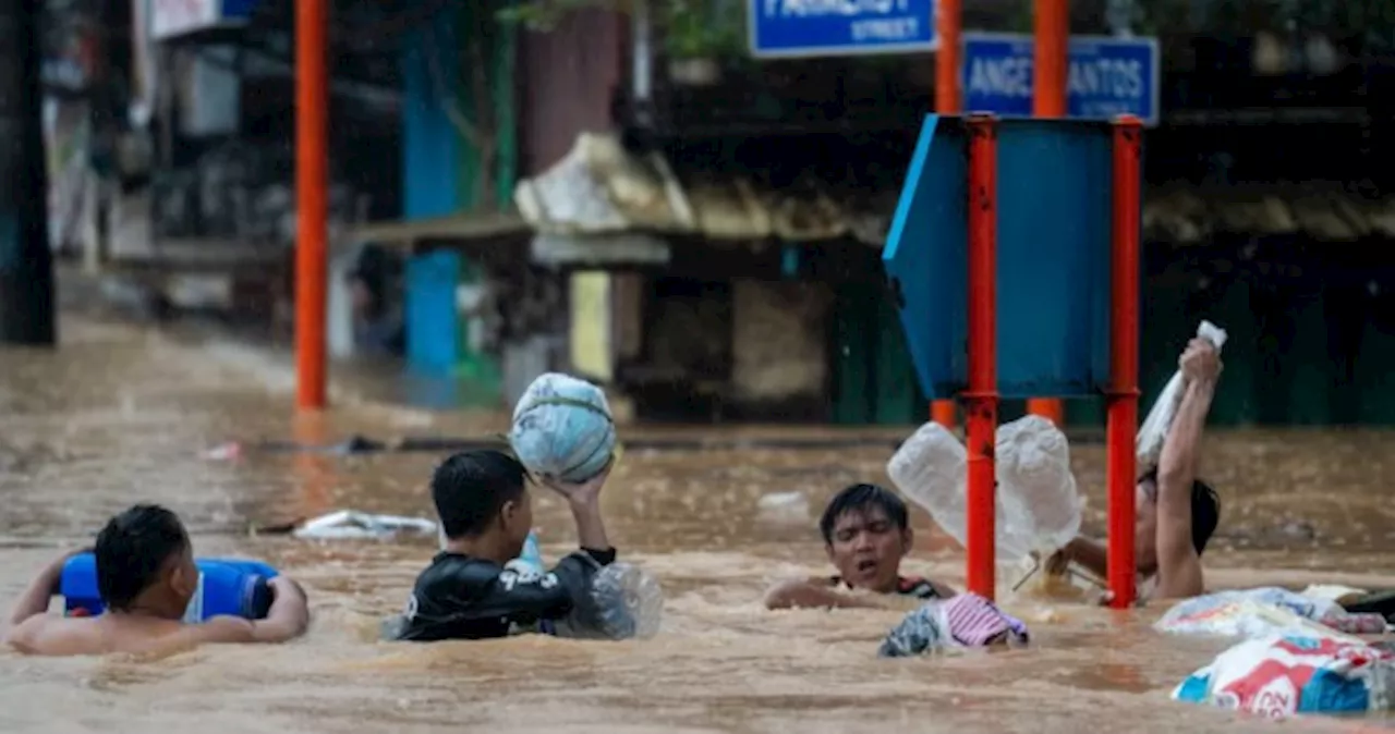 Floods, flights cancelled as Typhoon Gaemi dumps heavy rain on Manila